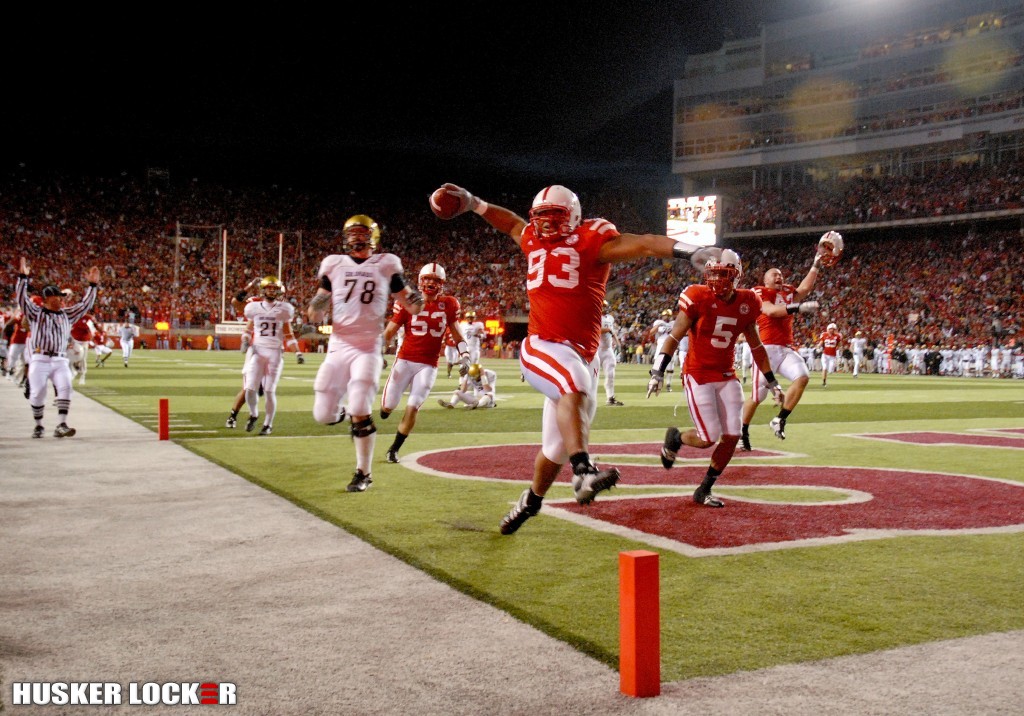 If you havn't already seen this, it's a picture of Suh's interception for a touchdown at the end of the NU vs CU game. Check out Steinkuler with his helmet off.  The side judge is looking right at him. I cannot believe the ref's didn't flag that or Suh spiking the ball on the wall in the back of the endzone. Look at Cody Hawkins in the background. <CLICK FOR MORE>